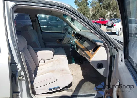 1990 Lincoln Town Car Signature z USA, uszkodzony, nr VIN 1LNLM82F2LY652380